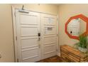Home entrance featuring double doors, decorative mirror, and accent furniture at 100 North Beach Blvd. # 313, North Myrtle Beach, SC 29582