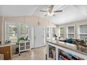 Sun room featuring tiled floors, lots of natural light, and neutral paint at 168 Saint Christopher Circle, Pawleys Island, SC 29585
