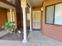 Unit 116 features a secure front entry and landscaped surroundings at 180 Rothbury Circle # 116, Myrtle Beach, SC 29572