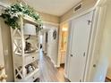 Hallway decorated with nautical theme and ample closet space at 180 Rothbury Circle # 116, Myrtle Beach, SC 29572