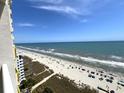 Scenic ocean view from a high vantage point showing the sandy beach and blue ocean waves at 2701 S Ocean Blvd. # 1507, North Myrtle Beach, SC 29582