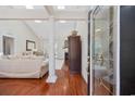 Inviting entryway with hardwood floors, elegant furnishings, and decorative glass front door at 3224 Hermitage Dr., Little River, SC 29566