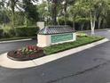 Savannah Shores entrance sign with manicured landscaping and decorative guard house at 9739 Leyland Dr. # 12, Myrtle Beach, SC 29572