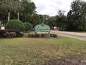 Savannah Shores community sign set amongst a lush green landscaped entrance at 9739 Leyland Dr. # 12, Myrtle Beach, SC 29572