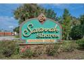 Savannah Shores condominium community sign with flower beds at 9750 Leyland Dr. # 4, Myrtle Beach, SC 29572