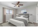 A bright bedroom with a comfortable bed and neutral decor at 1101 2Nd Ave. N # 1806, Surfside Beach, SC 29575