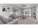 A spacious living room with modern decor and plenty of natural light at 1101 2Nd Ave. N # 1806, Surfside Beach, SC 29575