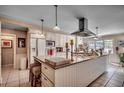Spacious kitchen with white cabinets, granite countertops, large island, and stainless steel appliances at 141 N Gate Rd., Myrtle Beach, SC 29572