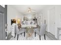 Bright, open-concept living room featuring modern furnishings and stylish decor at 175 Cypress Ln., Little River, SC 29566