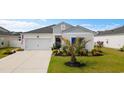 Charming single-Gathering home with a well-kept lawn, tasteful landscaping, and a convenient two-car garage in a lovely neighborhood at 179 S Reindeer Rd., Surfside Beach, SC 29575