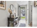 Home entryway featuring an accent table with decorative elements and light wood flooring at 239 Calhoun Falls Dr., Myrtle Beach, SC 29579