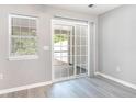 Bright living room with a window and a sliding glass door at 309 Seabert Rd. # 309, Myrtle Beach, SC 29579
