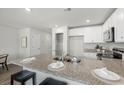 Modern kitchen with large island, granite countertops, stainless steel appliances, and ample cabinet space at 330 Bayou Loop # Lot 68, Surfside Beach, SC 29575