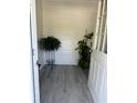 View of the entryway featuring light gray flooring and indoor plants at 402 Gibson St., Marion, SC 29571