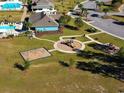 Aerial view showcasing the community playground, green spaces, and amenities, offering a Gathering-friendly environment at 4353 Falls Oaks St., Myrtle Beach, SC 29579