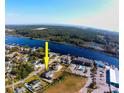 Stunning aerial view of the property, showcasing its location near the river and community amenities at 4546 River Rd., Little River, SC 29566