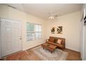 Cozy living space with a comfortable couch, bright window, and elegant area rug at 4660 Lightkeepers Way # 37B, Little River, SC 29566