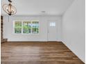 Bright and airy living space with lots of natural light from large windows at 4880 Highway 378, Conway, SC 29527