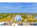 Aerial shot showcasing the Homewood Suites and Bay View Resort within a lush landscape at 504 N Ocean Blvd. # 1611, Myrtle Beach, SC 29577