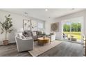Cozy living room with a sliding glass door, neutral color palette, stylish furniture, and contemporary decor at 512 Scarlet Sage Dr., Conway, SC 29527