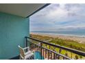 Enjoy views of the pool and ocean from this cozy private balcony at 6804 N Ocean Blvd. # 427, Myrtle Beach, SC 29572