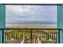 Relaxing ocean view from the private balcony, complete with outdoor seating at 6804 N Ocean Blvd. # 427, Myrtle Beach, SC 29572