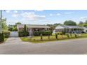 Quaint brick home with inviting front yard and 'For Sale' sign at 706 Birch Ln., Conway, SC 29526