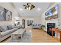Spacious living room boasts a fireplace, hardwood floors, and modern decor at 756 Lalton Dr., Conway, SC 29526