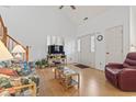 Cozy living room with hardwood floors and staircase at 829 9Th Ave. S, North Myrtle Beach, SC 29582