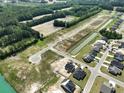 Aerial view of a new residential construction area featuring single-Gathering homes and planned community layout at 958 Oak Hollow St., Longs, SC 29568