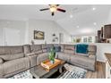 Spacious living room featuring an open layout, vaulted ceiling and a comfortable sofa at 122 Desurrency Ct., Georgetown, SC 29440