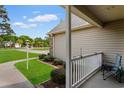 Side porch with view of landscape at 1674 Sw Beach Dr., Calabash, SC 28467