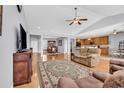 Spacious living room with hardwood floors and an open layout to the dining and kitchen areas at 1701 Boyne Dr., Myrtle Beach, SC 29588