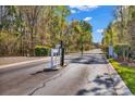 View of the black metal gate, marking the property entrance for security and exclusivity at 2208 Bentbill Circle, North Myrtle Beach, SC 29582