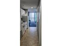 Cozy condo interior featuring full kitchen, ocean views, and sliding glass doors at 300 N Ocean Blvd. # 1732, North Myrtle Beach, SC 29582