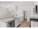 Modern kitchen with granite countertops, stainless steel appliances, and ample cabinet space at 3331 Little Bay Dr., Conway, SC 29526