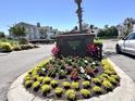 Beautifully landscaped Broadway Station sign welcomes you to the community at 3762 Citation Way # 1022, Myrtle Beach, SC 29572