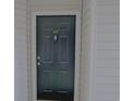 Close-up of the front door of a condo, featuring unit number and hardware at 3762 Citation Way # 1022, Myrtle Beach, SC 29572