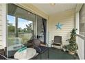 Charming porch with seating area, perfect for relaxing and enjoying the outdoors at 461 Red River Ct. # 36-I, Myrtle Beach, SC 29579