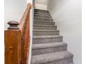 Carpeted stairway with wood railing at 505 Forestbrook Dr., Myrtle Beach, SC 29579