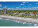 Coastal condominium complex on a white sand beach with Atlantic ocean views at 5601 N Ocean Blvd. # E-304, Myrtle Beach, SC 29577