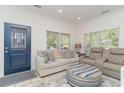 Cozy living room featuring a stylish sofa, accent pillows, and a modern recliner for ultimate relaxation at 6001-1872 S Kings Hwy., Myrtle Beach, SC 29575
