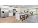 Modern kitchen featuring stainless steel appliances, granite counters and a spacious island at 619 Culmen Ct., Myrtle Beach, SC 29588