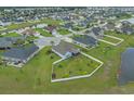 Aerial view of a well-manicured single-Gathering home with fenced yard at 713 Garland Ct., Myrtle Beach, SC 29588