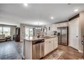 Open concept kitchen with granite countertops, stainless steel appliances, and island at 777 Woodland Farms Circle, Aynor, SC 29511
