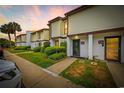Townhouse complex featuring well-maintained landscaping and assigned unit numbers at 1012 Possum Trot Rd. # F 42, North Myrtle Beach, SC 29582