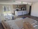 Bright kitchen with an island, modern appliances, and light wood cabinets at 116 Forman Way, Aynor, SC 29511