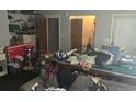 Game room cluttered with pool table, sofa, and other household items at 1769 Crooked Pine Rd., Surfside Beach, SC 29575