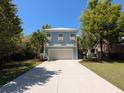 Beautiful two-story home with a long driveway and a well manicured lawn that accentuates its appeal at 18 Trigger Fish Ln., Murrells Inlet, SC 29576