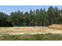 Newly poured concrete foundation ready for building in a wooded area at 2919 Hughes Gasque Rd., Aynor, SC 29511